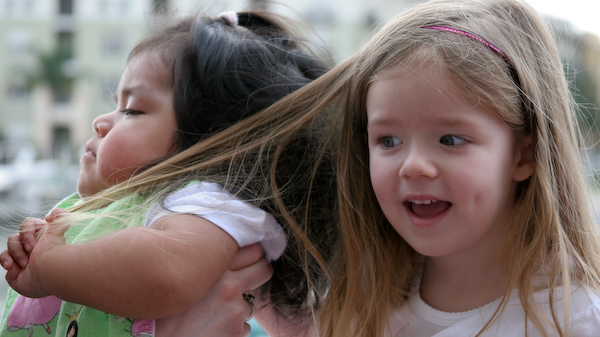 Carmen pulling Lauren's hair