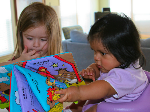 Carmen and Lauren with book