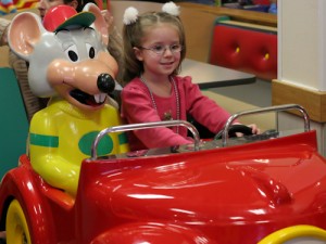 Lauren and Chuck E. Cheese in car Lauren and Chuck E. Cheese in car
