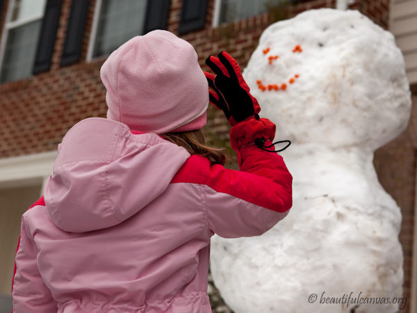 Lauren looking at snowman Lauren looking at snowman