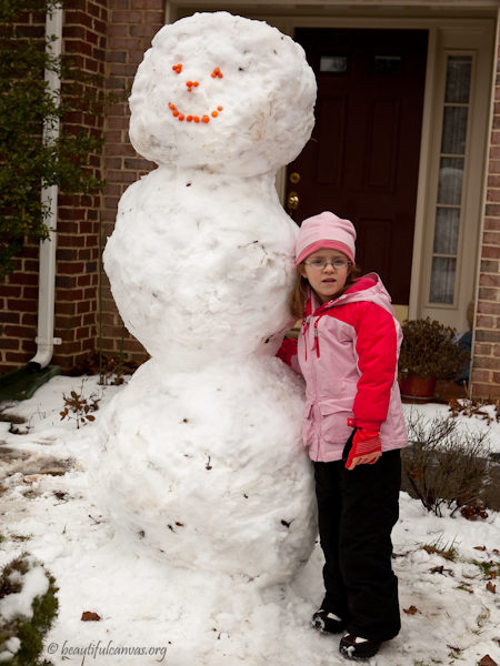 Lauren next to snowman Lauren next to snowman