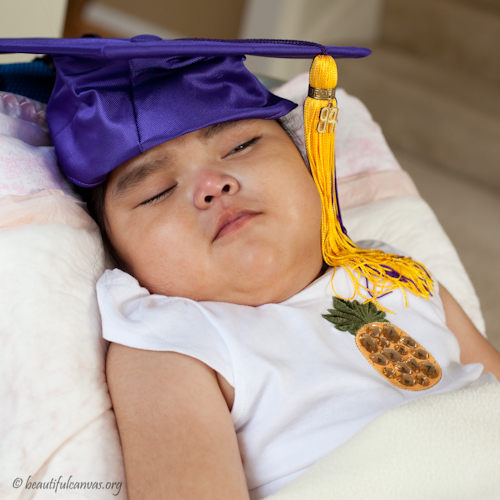 Carmen wearing Lana's graduation hat