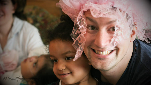 Wes with tutu on his head