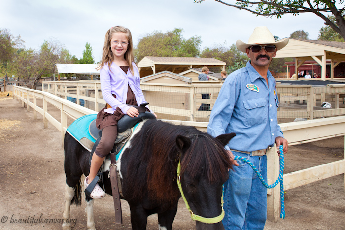 Lauren riding a horse