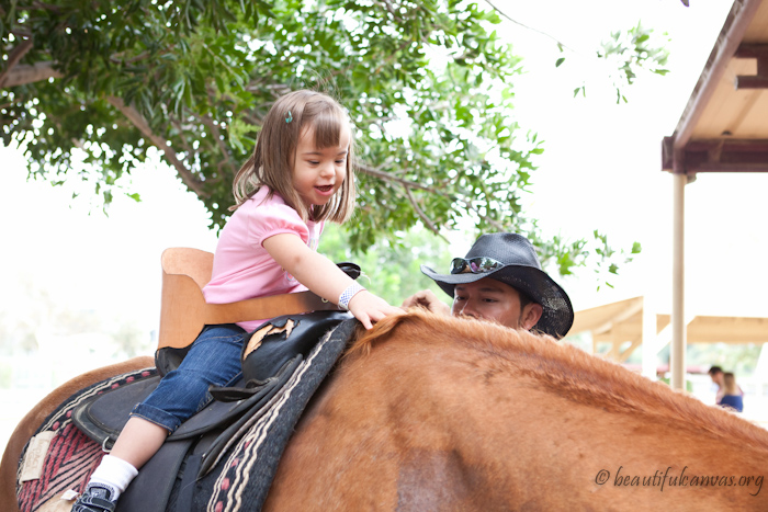 Lona petting the horse