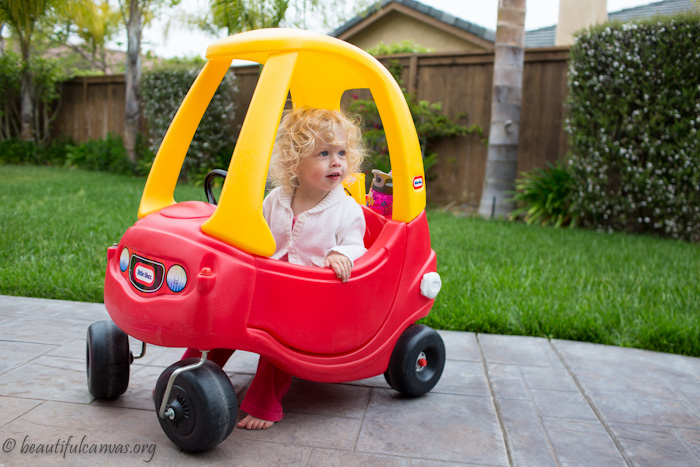 Hope in her red car