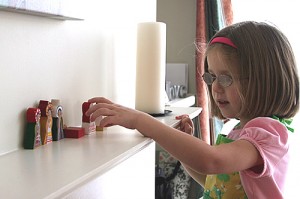 Lauren arranging nativity set