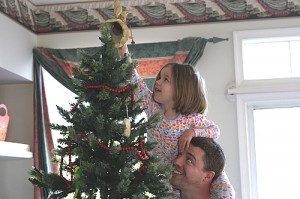 Lauren topping the tree